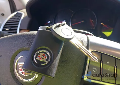 2009 Cadillac Srx V6 z USA, uszkodzony, nr VIN 1GYEE637390113015